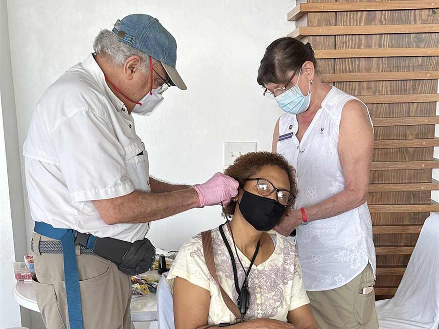 Dr Roger and Liz Fagan providing free hearing care
