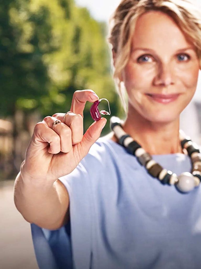 Find out about Oticon Reveal Hearing Aids in the UK at your local Amplify Hearing practice